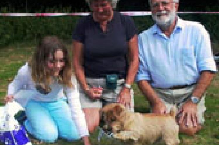 Skipper won the "Baginton Bullet" This is his family with his handler Sally